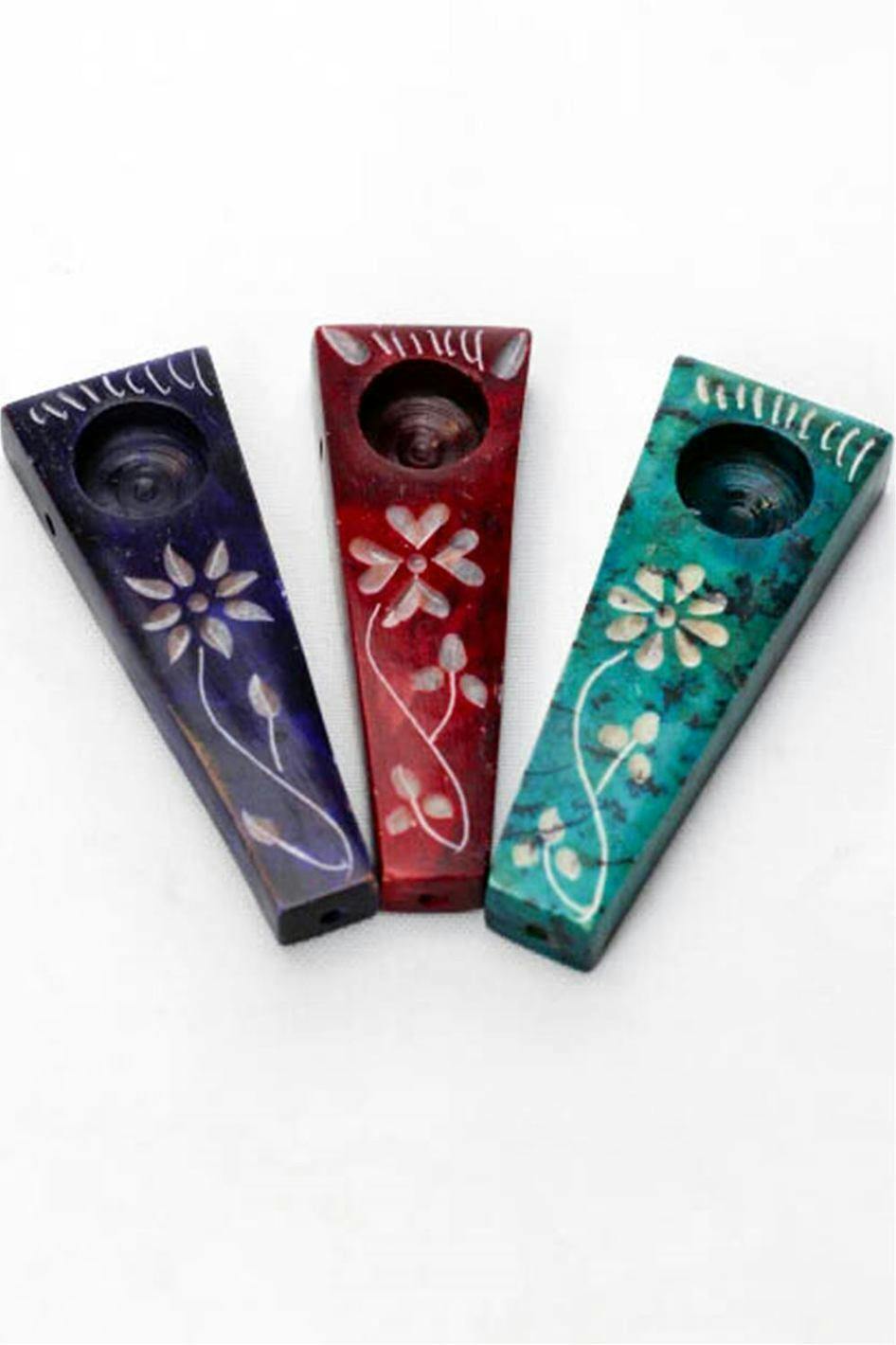 Flower engraved stone pipe