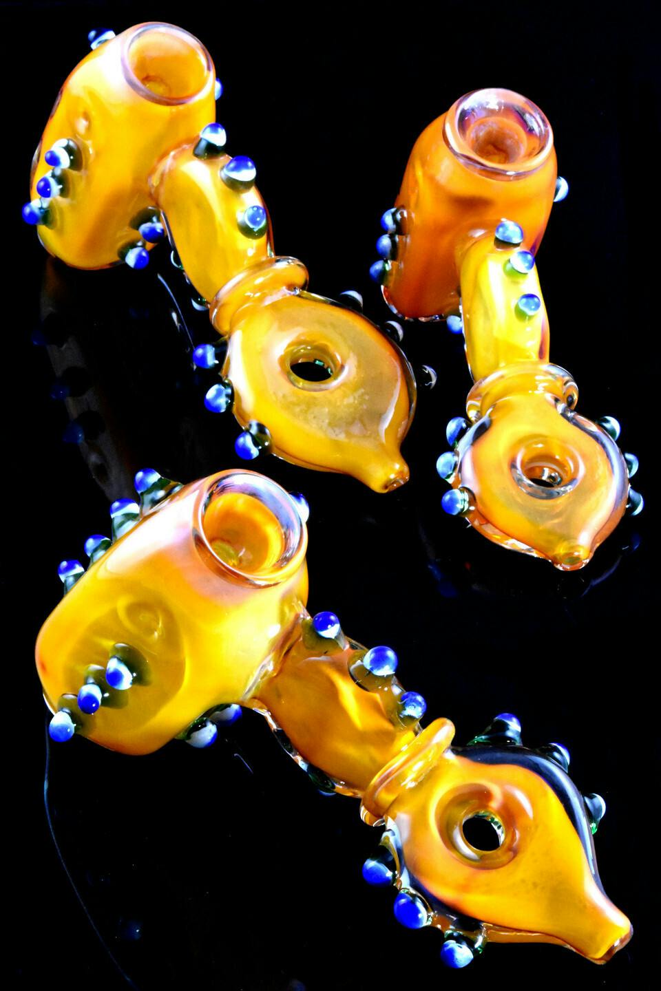 Medium gold fumed doughnut whole glass hammer bubbler