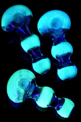 Thick glow in the dark gold fumed frit glass pipe