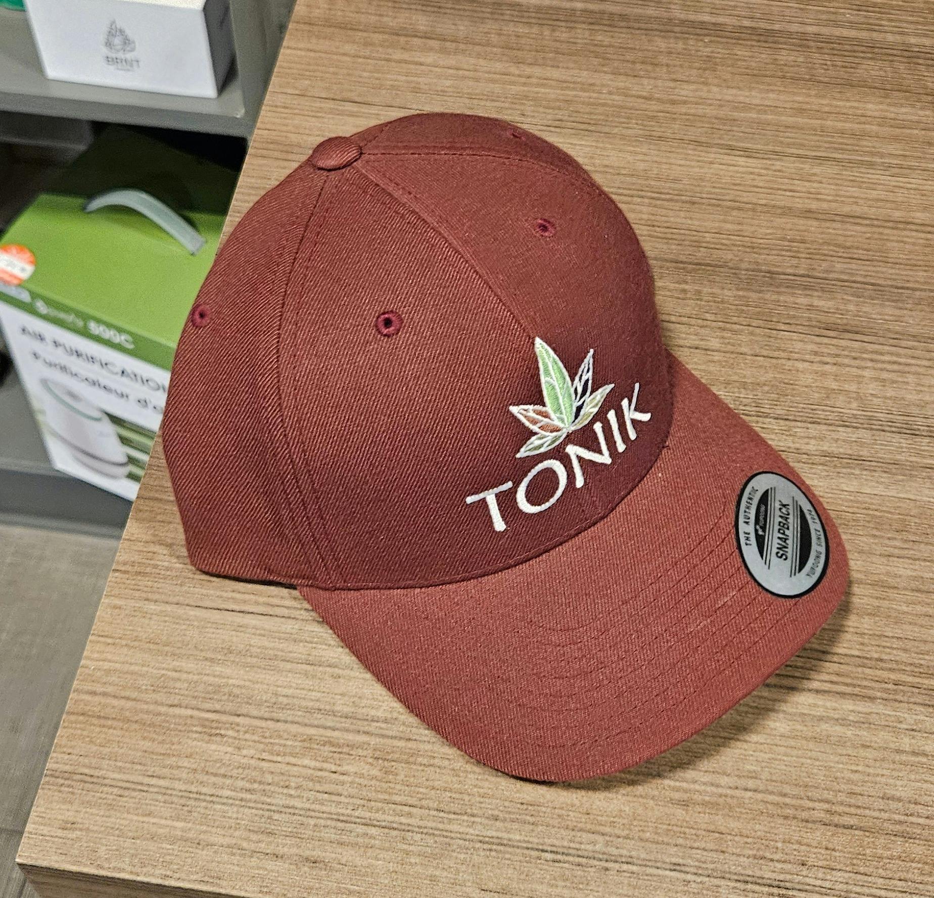 Tonik premium snapback cap - maroon color logo