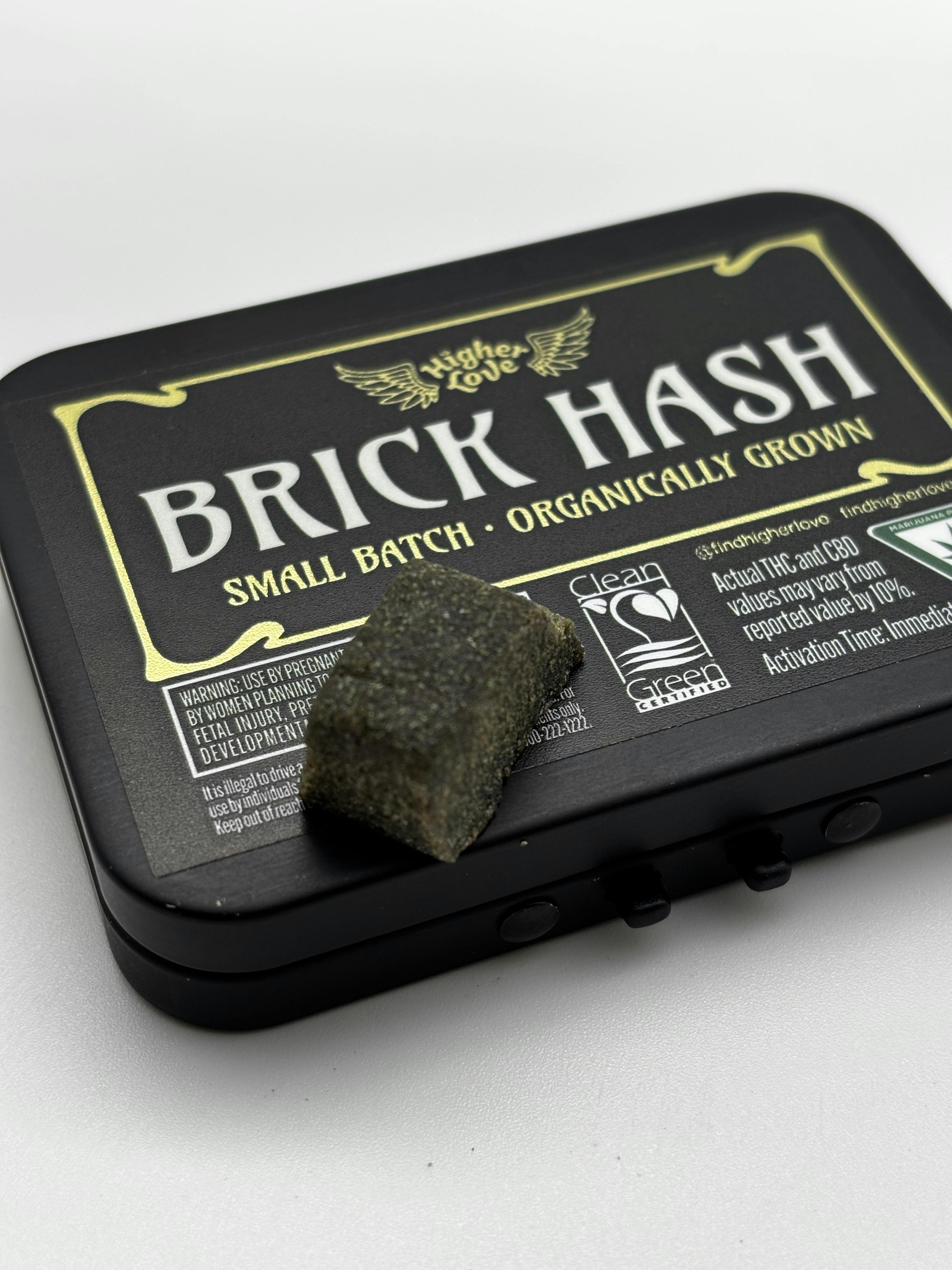 Higher Love GMO Brick Hash at Higher Love Cannabis Dispensary Munising