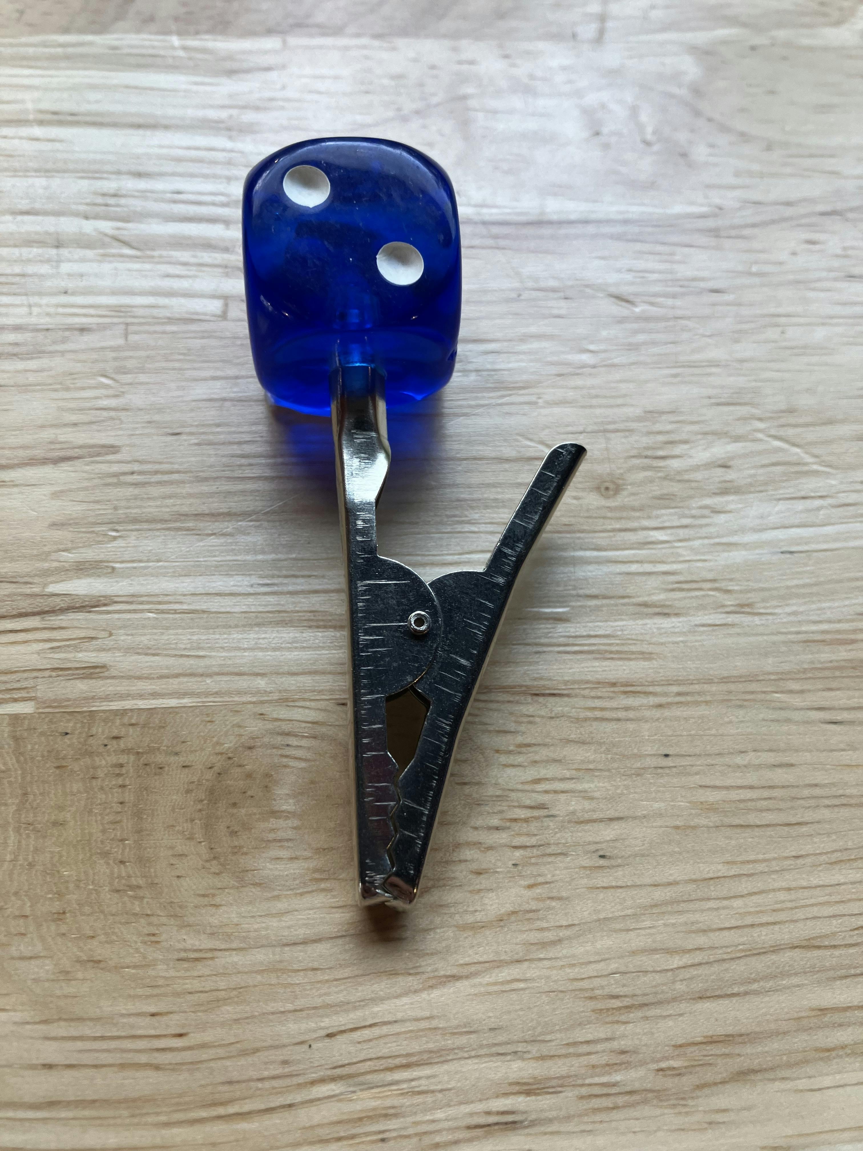 Dice Roach Clip